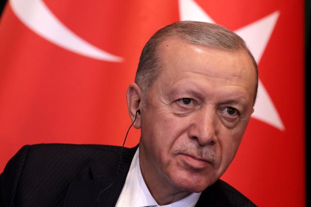 (FILES) Turkey's President Recep Tayyip Erdogan attends a joint press conference with Albanian Prime Minister at the Prime Minister's office in Tirana, on October 10, 2024. A top adviser to Recep Tayyip Erdogan said the Turkish leader would run again in an early election likely to be held in April 2028, media outlets reported on September 17, 2026. (Photo by Adnan Beci / AFP)