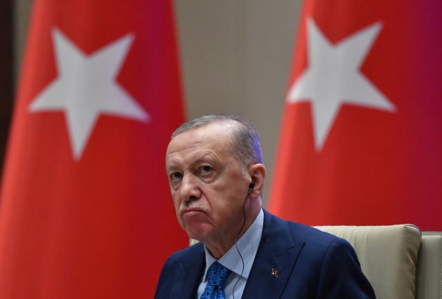 (FILES) Turkish President Recep Tayyip Erdogan participates in an extended meeting following a meeting with his Kyrgyz counterpart at the Yntymak Ordo state residence in Bishkek on November 5, 2024. A top adviser to Recep Tayyip Erdogan said the Turkish leader would run again in an early election likely to be held in April 2028, media outlets reported on September 17, 2026. (Photo by VYACHESLAV OSELEDKO / AFP)