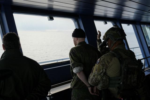 Members of Finnish Border Guard, Police and Armed Forces take part in the MARSEC EU 26 joint exercise hosted by the Finnish Border Guard aboard the Finnish icebreaking vessel Polaris, owned and operated by Finnish state-owned company Arctia, off Helsinki in the Gulf of Finland, Finland on September 17, 2026. MARSEC EU 26 is the European Union's third annual maritime security exercise and is currently taking place in Finland. Hosted by the Finnish Border Guard and organised together with EU Member States and agencies, the exercise supports better coordination and information exchange. Special attention is given to protecting key underwater infrastructure, including cables and pipelines, and to dealing with suspicious maritime activity and potential hybrid threats. (Photo by Alessandro RAMPAZZO / AFP)
