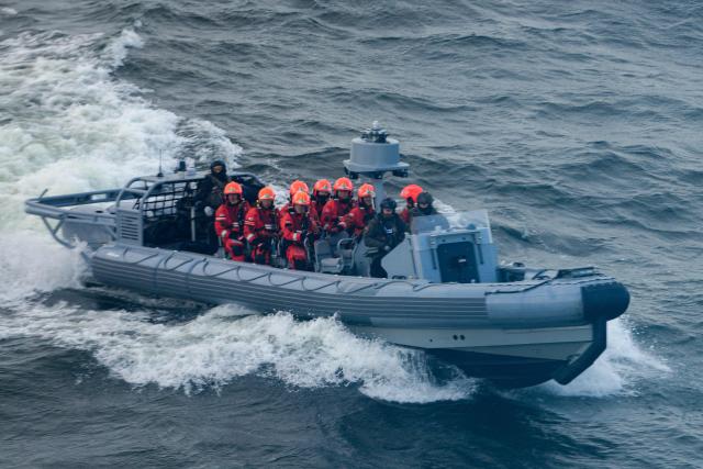 A Zodiac Hurricane boat appraoches the Finnish icebreaking vessel Polaris, owned and operated by Finnish state-owned company Arctia, as members of Finnish Border Guard, Police and Armed Forces take part in the MARSEC EU 26 joint exercise hosted by the Finnish Border Guard off Helsinki in the Gulf of Finland, Finland on September 17, 2026. MARSEC EU 26 is the European Union's third annual maritime security exercise and is currently taking place in Finland. Hosted by the Finnish Border Guard and organised together with EU Member States and agencies, the exercise supports better coordination and information exchange. Special attention is given to protecting key underwater infrastructure, including cables and pipelines, and to dealing with suspicious maritime activity and potential hybrid threats. (Photo by Alessandro RAMPAZZO / AFP)