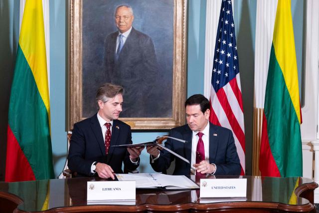 US Secretary of State Marco Rubio and Lithuanian Foreign Minister K?stutis Budrys (L) trade documents as they sign a Critical Minerals Framework Memorandum of Understanding during a signing ceremony at the State Department in Washington, DC, September 17, 2026. (Photo by SAUL LOEB / AFP)