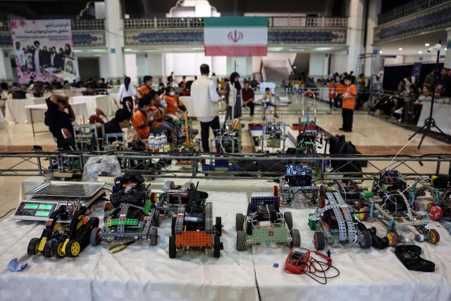 Robots built by Iranian students sit on a table during the RoboCup IranOpen event at Tehran's Mosallah Mosque on September 17, 2026. (Photo by AFP)