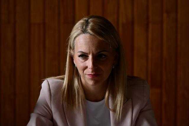 French MP of the far-right Rassemblement National (RN) group Edwige Diaz looks on during a visit of her party's 2027 French presidential candidate in Le Porge, south-western France, on September 17, 2026, months after a wildfire destroyed some 183 homes in the town as part of a broader blaze that swept through the Gironde department this summer. The National Rally is making Gironde, where Marine Le Pen is visiting on September 17, 2026, a key step in its bid to gain a foothold in the Senate. In 2020, the Green candidate was elected there, a first in the region, far ahead of the National Rallys candidate, Edwige Diaz. Six years later, the vote on September 27 is looking bleak for the Greens, who have lost grand electors, unlike the far right. (Photo by Philippe LOPEZ / AFP)