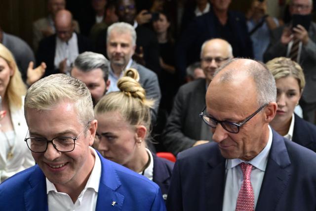 The conservative Christian Democratic Union (CDU) party's lead candidate for the Berlin state election, Stefan Evers and German Chancellor Friedrich Merz attend a campaign event at the CDU headquarters in Berlin, on September 17, 2026. Berlin's State elections take place on September 20, 2026. (Photo by John MACDOUGALL / AFP)
