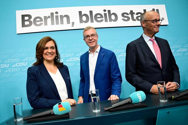 (From L) Secretary General of Germany's Christian Democratic Union (CDU) Franziska Hopperman, the party's top candidate for the Berlin state election, Stefan Evers, and German Chancellor Friedrich Merz attend a campaign event at the CDU headquarters in Berlin, eastern Germany, on September 17, 2026. (Photo by John MACDOUGALL / AFP)