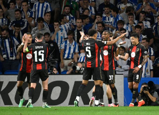 Bournemouth's Brazilian forward #37 Rayan Rocha (R) celebrates with teammates scoring his team's second goal during the UEFA Europa League 1st round day 1 football match between Real Sociedad and AFC Bournemouth at Anoeta Stadium in San Sebastian on September 17, 2026. (Photo by ANDER GILLENEA / AFP)