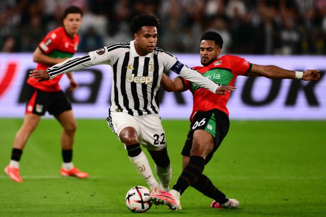 Juventus’ US midfielder #22 Weston McKennie (C) fights for the ball with NEC Nijmegen’s German defender #66 Almugera Kabar during the UEFA Europa League 1st round day 1 football match between Juventus and NEC Nijmegen at the Allianz Stadium in Turin on September 17, 2026. (Photo by Marco Bertorello / AFP)