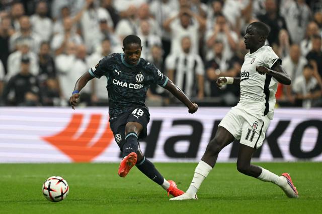 Marseille’s French forward #48 Keyliane Abdallah (L) shoots to score his team's first goal during the UEFA Europa League first round 1 day 1 football match between Besiktas and Olympique de Marseille (OM) at Besiktas Tupras Stadium in Istanbul, on September 17, 2026. (Photo by Ozan KOSE / AFP)