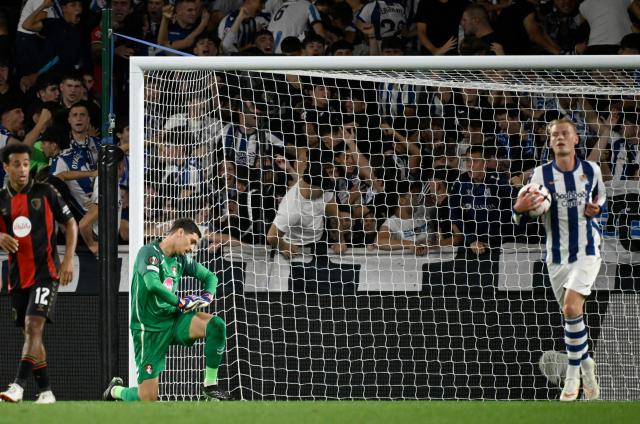 Bournemouth's Serbian goalkeeper #01 Djordje Petrovic looks dejected after Real Sociedad's Spanish forward #17 Sergio Gomez (not seen) scored his team's first goal during the UEFA Europa League 1st round day 1 football match between Real Sociedad and AFC Bournemouth at Anoeta Stadium in San Sebastian on September 17, 2026. (Photo by ANDER GILLENEA / AFP)