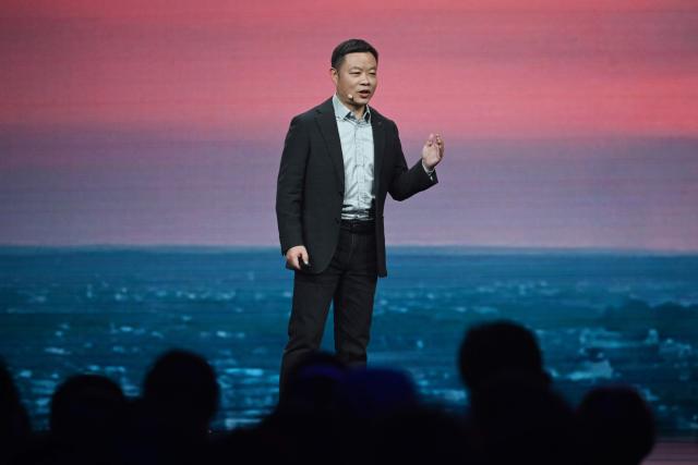 He Xiaopeng, Chairman and CEO of Chinese car maker XPeng, speaks on stage at the launch of the XPeng G9L SUV in Beijing on September 17, 2026. The car, which comes in pure electric and hybrid variants, will be produced in factories in Guangzhou, in southern China, and Graz, Austria. (Photo by GREG BAKER / AFP)