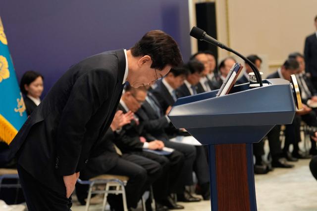 South Korean President Lee Jae Myung bows during a press conference at the presidential Blue House in Seoul on September 18, 2026. (Photo by Ahn Young-joon / POOL / AFP)