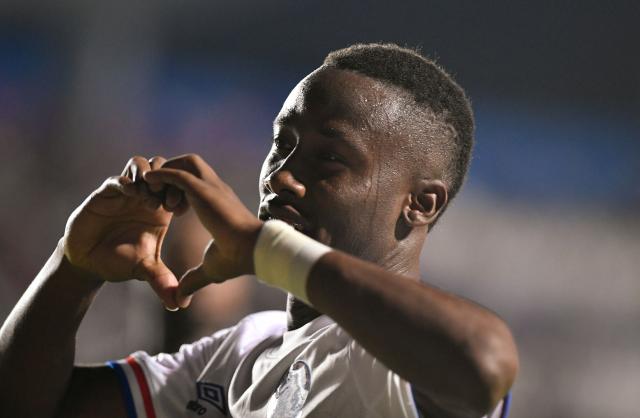 Olimpia's defender #15 Kevin Guiti celebrates after scoring his team's second goal during the second-leg quarterfinal football match of the Concacaf Central American Cup between Honduras' Club Olimpia and El Salvador's L.A. Firpo at the Celato Ucles National Stadium in Tegucigalpa on September 17, 2026. (Photo by Orlando SIERRA / AFP)