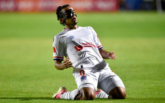 Olimpia's midfielder #08 Edwin Rodriguez celebrates after scoring his team's third goal during the second-leg quarterfinal football match of the Concacaf Central American Cup between Honduras' Club Olimpia and El Salvador's L.A. Firpo at the Celato Ucles National Stadium in Tegucigalpa on September 17, 2026. (Photo by Orlando SIERRA / AFP)
