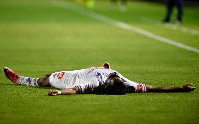 Olimpia's midfielder #08 Edwin Rodriguez celebrates after scoring his team's third goal during the second-leg quarterfinal football match of the Concacaf Central American Cup between Honduras' Club Olimpia and El Salvador's L.A. Firpo at the Celato Ucles National Stadium in Tegucigalpa on September 17, 2026. (Photo by Orlando SIERRA / AFP)