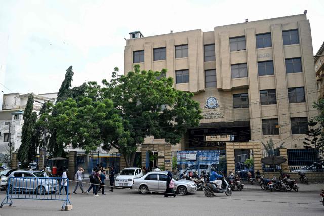 Medical students arrive at the Dow University of Health Sciences in Karachi on September 18, 2026. Dozens of Afghans studying to be doctors in Pakistan hope a court hearing on September 18 will overturn an order by the country's medical board for them to be expelled from colleges and universities and sent home. (Photo by Rizwan TABASSUM / AFP)