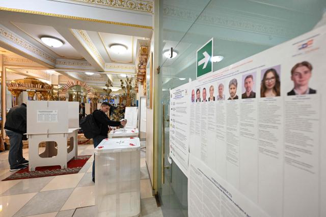 A man casts his ballot for Russia's parliamentary election at a polling station in Moscow on September 18, 2026. (Photo by Igor IVANKO / AFP)