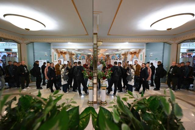 Voters queue at a polling station during Russia's parliamentary election in Moscow on September 18, 2026. (Photo by Igor IVANKO / AFP)
