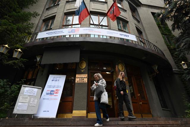 Women leave a polling station during Russia's parliamentary election in Moscow on September 18, 2026. (Photo by Igor IVANKO / AFP)
