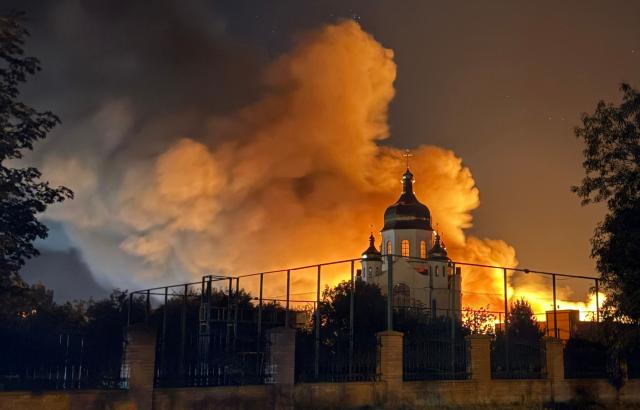 This photograph shows a burning mall following a drone strike in Zaporizhzhia, late on September 17, 2026, amid the Russian invasion of Ukraine. (Photo by Darya NAZAROVA / AFP)