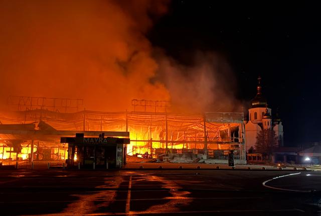 This photograph shows a burning mall following a drone strike in Zaporizhzhia, late on September 17, 2026, amid the Russian invasion of Ukraine. (Photo by Darya NAZAROVA / AFP)