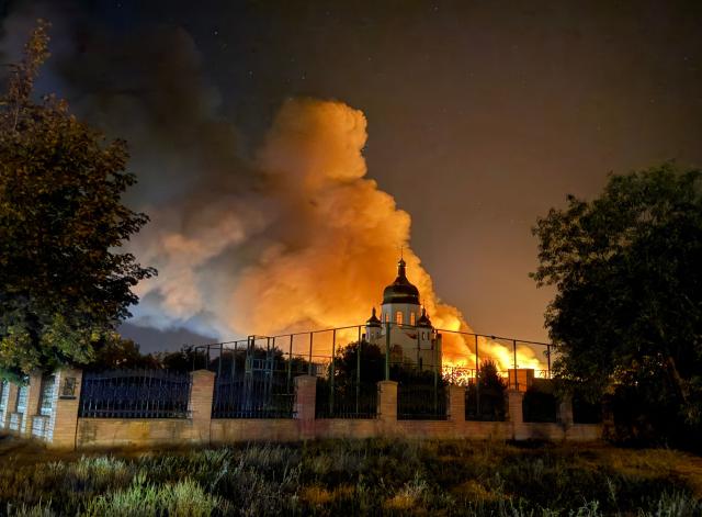 This photograph shows a burning mall following a drone strike in Zaporizhzhia, late on September 17, 2026, amid the Russian invasion of Ukraine. (Photo by Darya NAZAROVA / AFP)