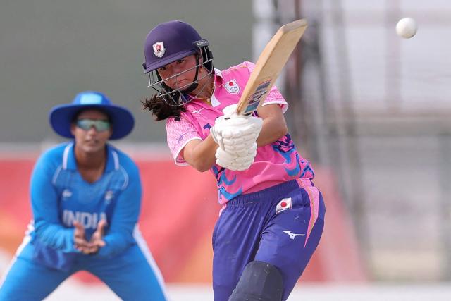 Japan's Ayaka Kato Stafford (C) hits a shot during the women's cricket match between Japan and India at the 2026 Asian Games in Nagoya on September 18, 2026. (Photo by JIJI Press / AFP) / Japan OUT