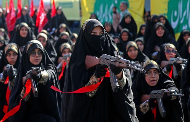 Members of Iran's Basij paramilitary force take part in a military rally named Jan-Fada (those willing to sacrifice their lives) in Tehran September 18, 2026. (Photo by AFP) / Israel OUT / NO Access Israel Media/Persian Language TV Stations Outside Iran / Strictly No Access BBC Persian / VOA Persian/Manoto TV / Iran International
/ Radio Farda --
Attention editors: AFP covers the war in the Middle East through its extensive regional network, including bureaus in Tehran, Jerusalem, and several neighboring countries. Since the start of the conflict, journalists have been working under increasingly restrictive conditions. Authorities in several countries have limited reporters' movements, photo and live video coverage from sensitive locations. Some governments and armed groups have banned images of missile or drone strikes and other security-related sites. / 
