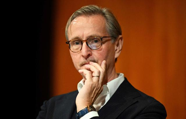 Belgian Peter de Caluwe, upcoming artistic director of the Salzburg Festival after the 2027 festival, reacts during a press conference for the presentation of his new role at the 'Salzburger Festspiele' in Salzburg, Austria, on September 18, 2026. (Photo by BARBARA GINDL / APA / AFP) / Austria OUT