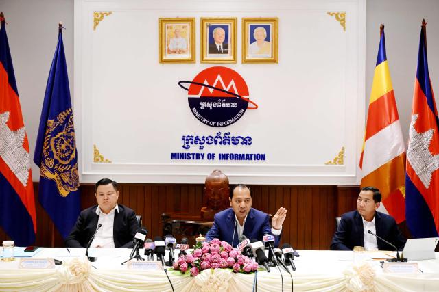 Cambodia's Information Minister Neth Pheaktra (C) speaks during a press conference at the Ministry of Information in Phnom Penh on September 18, 2026, regarding the upcoming International Conference on combating online scams scheduled for September 23–24. (Photo by TANG CHHIN Sothy / AFP)