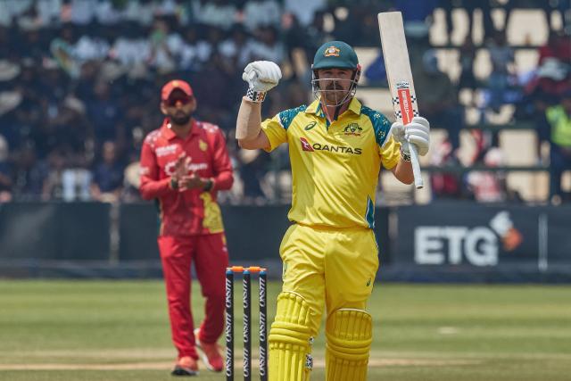 Australia's Travis Head celebrates after scoring a century (100 runs) during the second one-day international (ODI) cricket match between Zimbabwe and Australia at the Harare Sports Club in Harare on September 18, 2026. (Photo by Jekesai NJIKIZANA / AFP)
