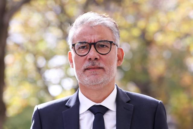 Candidate in the Socialist (PS) and centre-left Place Publique (PP) parties primary ahead of France's 2027 presidential election Olivier Faure looks on before talking to the press as he leaves after a meeting with France's President at the presidential Elysee Palace in Paris on September 18, 2026, to discuss international conflicts and their domestic implications. (Photo by Kenzo TRIBOUILLARD / AFP)