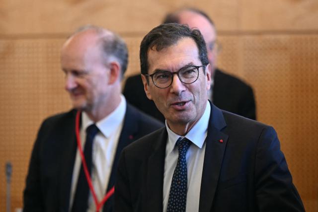 France's Labour Minister Jean-Pierre Farandou arrives to present the findings of the Labour, Employment and Pensions Conference (CTER) at the Economic, Social and Environmental Council (CESE) in the presence of social partners in Paris on September 18, 2026. (Photo by LOU BENOIST / AFP)