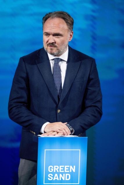 EU Commissioner for Energy and Housing Dan Joergensen reacts on stage during the inauguration of the Greensand carbon capture and storage (CCS) project in Esbjerg, Denmark, on September 18, 2026. Greensand is the first project in the European Union designed to demonstrate a full CCS value chain, including the capture, transport and storage of carbon dioxide in depleted oil and gas reservoirs beneath the North Sea. (Photo by Bo Amstrup / Ritzau Scanpix / AFP) / Denmark OUT