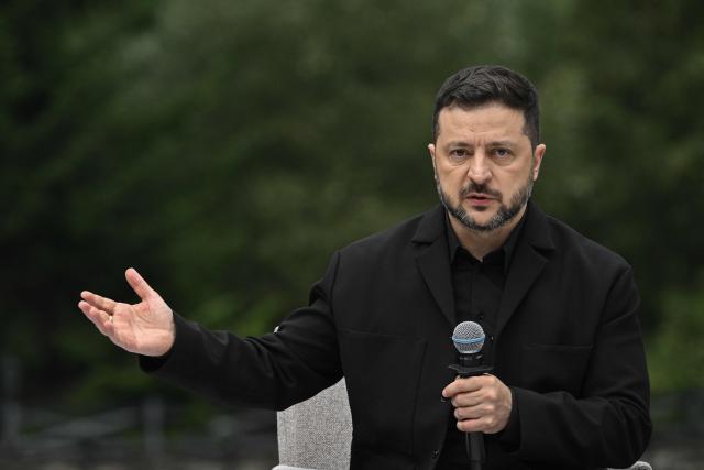 TOPSHOT - President of Ukraine Volodymyr Zelensky speaks during a joint press conference following the Carpathian 8 summit in state residence in Ivano-Frankivsk region on September 18, 2026, amid the Russian invasion of Ukraine. (Photo by Genya SAVILOV / AFP)