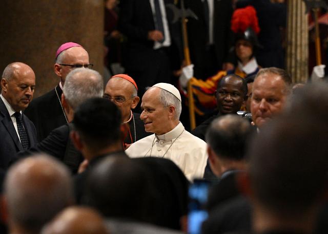 Pope Leo XIV (C) and Italian cardinal Baldassare Reina (centre L) attend a Diocesan assembly of Rome at the Basilica of Saint John Lateran, in central Rome, on September 18, 2026. (Photo by Andreas SOLARO / AFP)