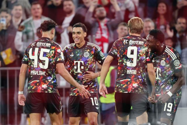 Bayern Munich's German midfielder #10 Jamal Musiala (2L) celebrates scoring his team's first goal during the German first division Bundesliga football match between FC Bayern Munich and Union Berlin in Munich, southern Germany on September 18, 2026. (Photo by Alexandra BEIER / AFP)