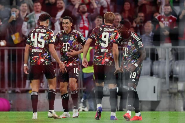 Bayern Munich's German midfielder #10 Jamal Musiala (2L) celebrates scoring his team's first goal during the German first division Bundesliga football match between FC Bayern Munich and Union Berlin in Munich, southern Germany on September 18, 2026. (Photo by Alexandra BEIER / AFP)