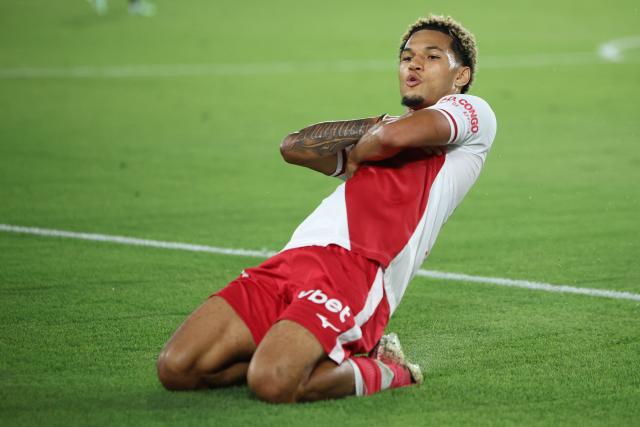 Monaco's German forward #29 Paris Brunner celebrates after scoring a goal during the French L1 football match between AS Monaco and RC Lens at the Stade Louis II in Monaco on September 18, 2026. (Photo by Valery HACHE / AFP)