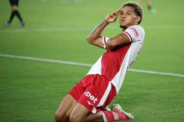 Monaco's German forward #29 Paris Brunner celebrates after scoring a goal during the French L1 football match between AS Monaco and RC Lens at the Stade Louis II in Monaco on September 18, 2026. (Photo by Valery HACHE / AFP)