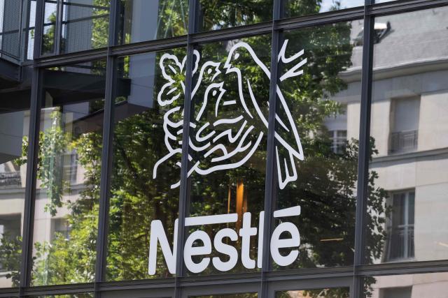 (FILES) This photograph shows a logo of Swiss food giant Nestle on the facade of a company building, in Issy-les-Moulineaux, south of Paris, on August 12, 2025. Russian authorities have seized the businesses and assets of Swiss food giant Nestle and three French groups, a move the Kremlin defended on September 18, 2026 as a justified measure against firms representing "unfriendly countries" that back Ukraine. (Photo by Martin LELIEVRE / AFP)