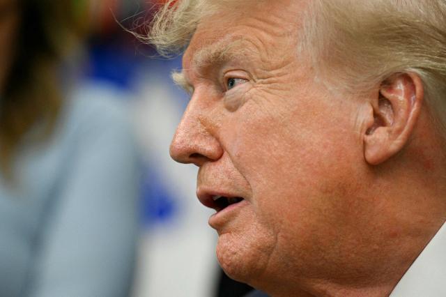 US President Donald Trump speaks about healthcare in the Oval Office of the White House in Washington, DC, on September 18, 2026. (Photo by Jim WATSON / AFP)
