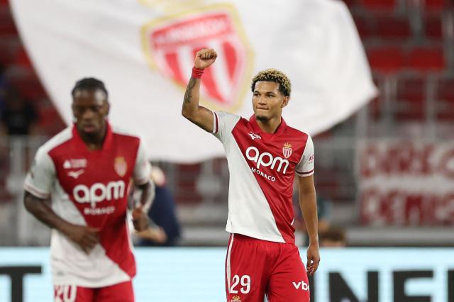 Monaco's German forward #29 Paris Brunner (R) celebrates after scoring a goal during the French L1 football match between AS Monaco and RC Lens at the Stade Louis II in Monaco on September 18, 2026. (Photo by Valery HACHE / AFP)