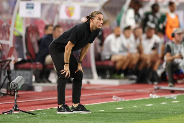 Monaco's Brazilian headcoach Filipe Luis reacts during the French L1 football match between AS Monaco and RC Lens at the Stade Louis II in Monaco on September 18, 2026. (Photo by Valery HACHE / AFP)