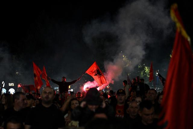 Kosovo Albanians gather during a rally in Pristina on September 18, 2026, two days after Kosovo's former president Hashim Thaci was sentenced in The Hague. Armend NIMANI / AFP. Thaci was sentenced to 25 years in prison by a tribunal in The Hague on September 16, 2026 for war crimes, in a verdict that sparked shock and anger among many Kosovars. Judges found Thaci and three other former Kosovo Liberation Army (KLA) leaders guilty of illegal arrests, torture, murder and cruel treatment of people during the 1998-1999 war for independence from Serbia. (Photo by Armend NIMANI / AFP)
