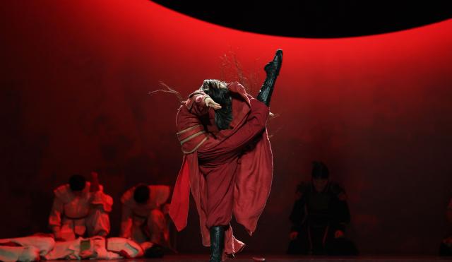 Tang Xinyi as Mulan and dancers from the China Ningbo Performance & Arts Group performs a scene from The award-winning Chinese dance drama “Mulan” during a dress rehearsal at the David H. Koch Theater at Lincoln Center in Nedw York on September 18, 2026. The China Arts and Entertainment Group (CAEG) is presenting the New York debut of the award-winning dance drama. (Photo by TIMOTHY A. CLARY / AFP)
