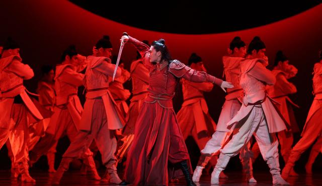 Tang Xinyi as Mulan and dancers from the China Ningbo Performance & Arts Group performs a scene from The award-winning Chinese dance drama “Mulan” during a dress rehearsal at the David H. Koch Theater at Lincoln Center in Nedw York on September 18, 2026. The China Arts and Entertainment Group (CAEG) is presenting the New York debut of the award-winning dance drama. (Photo by TIMOTHY A. CLARY / AFP)