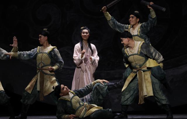 Dancers from the China Ningbo Performance and Arts Group perform a scene from the award-winning Chinese dance drama “Mulan” during a dress rehearsal at the David H. Koch Theater at Lincoln Center in New York on September 18, 2026. The China Arts and Entertainment Group (CAEG) is presenting the New York debut of the award-winning dance drama. (Photo by TIMOTHY A. CLARY / AFP)