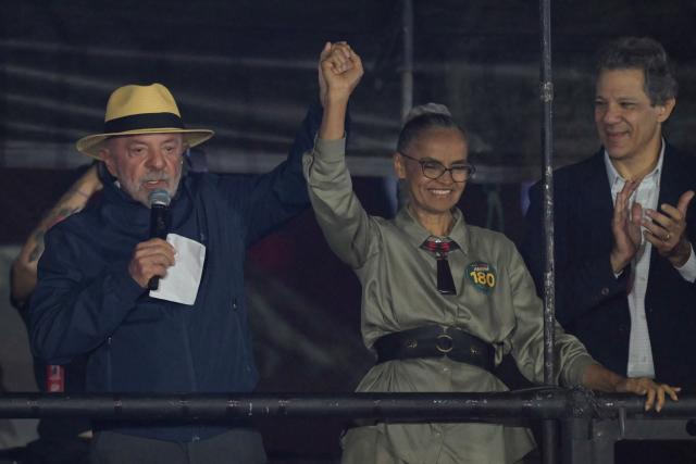 Brazil's President and presidential candidate Luiz Inacio Lula da Silva (L) greets supporters with candidate for the Senate for the state of São Paulo (REDE), Marina Silva, and candidate for governor of the state of Sao Paulo (PT), Fernando Haddad during a campaign rally in Guarulhos, metropolitan area of Sao Paulo, Brazil on September 18 2026. Brazil will hold a presidential election on October 4 2026. (Photo by NELSON ALMEIDA / AFP)