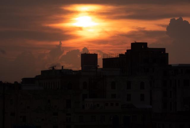 The sun sets over Havana during a power outage on September 18, 2026. Cuba was plunged into its seventh massive blackout of the year on September 18, 2026. Cuba was plunged into its seventh massive blackout of the year on September 18, 2026, the energy ministry said, as fuel shortages bite on the US-blockaded island. (Photo by ADALBERTO ROQUE / AFP)