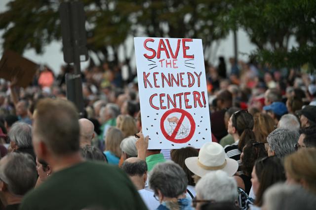 A "Save The Kennedy Center" sign is held up as people gather during a rally in support of the Kennedy Center in Washington, DC, on September 18, 2026. (Photo by Kent NISHIMURA / AFP)